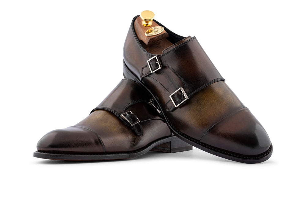 Boucle en cuir à double main