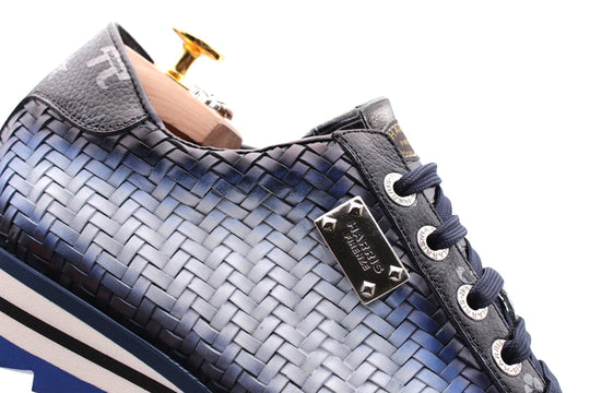 Sneakers in pelle intrecciata sfumata a mano