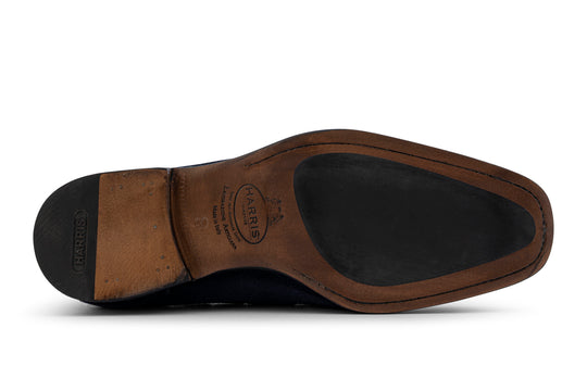 Mokassin mit Bommel aus handgefärbtem Wildleder