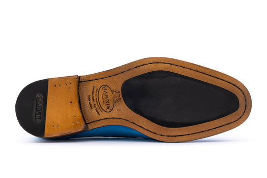 Mocassino in suede con pon pon