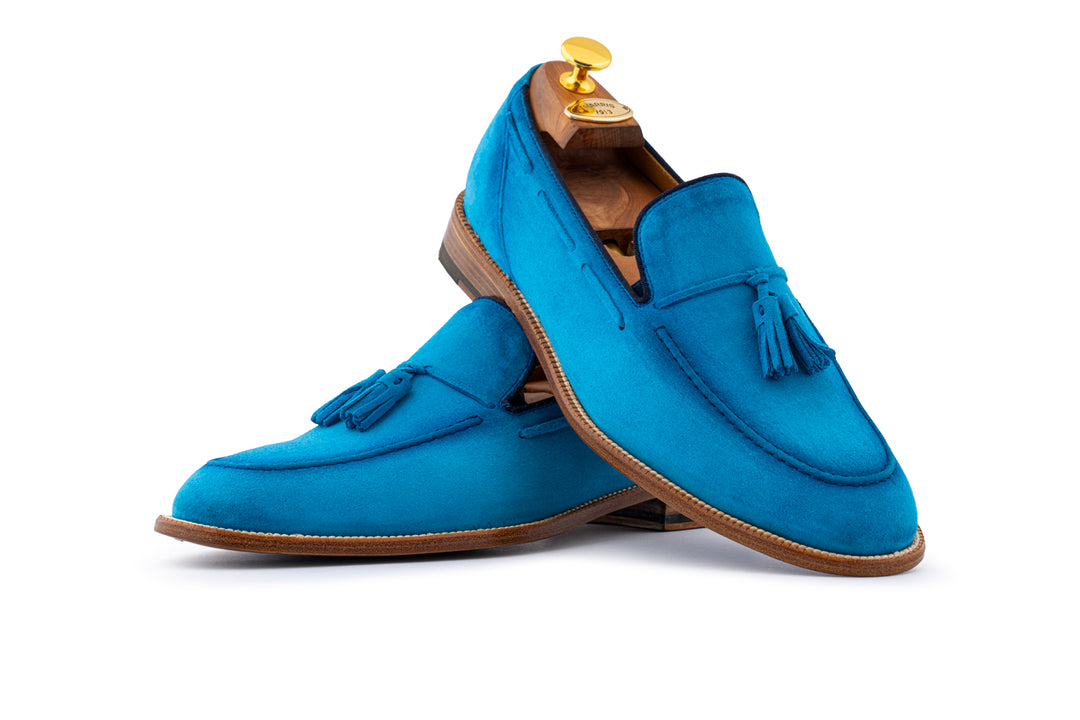 Mocassino in suede con pon pon