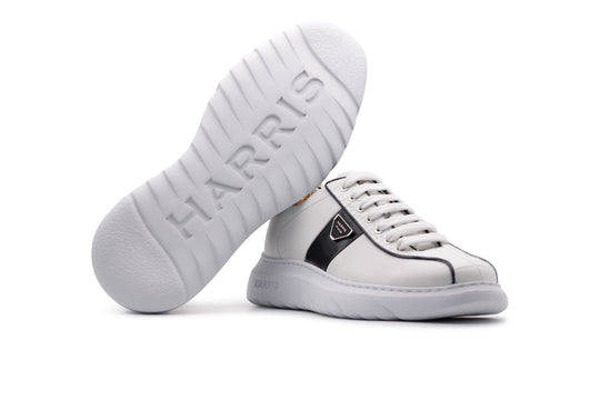 Sneakers in pelle con effetto coccodrillo